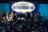 The Chief Electoral Officer announcing the result of the Northern Ireland referendum at the King's Hall, Belfast, 22 May 1998