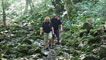 Derek and Sarah clamber up an old dried up river bed.