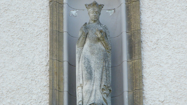 A statue of St Margaret above the entrance to the nursing home.