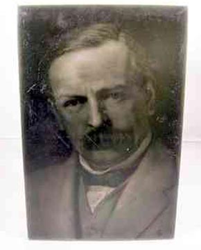 An early 20th Century J.H Barratt & Co., dust pressed Emaux Ombrants portrait tile of David Lloyd George