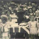 'Old Mother Rielly  and Kitty' Terry Darlow right foreground with dog Floss at VE Day street party