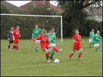 LFC Girls kicking the ball