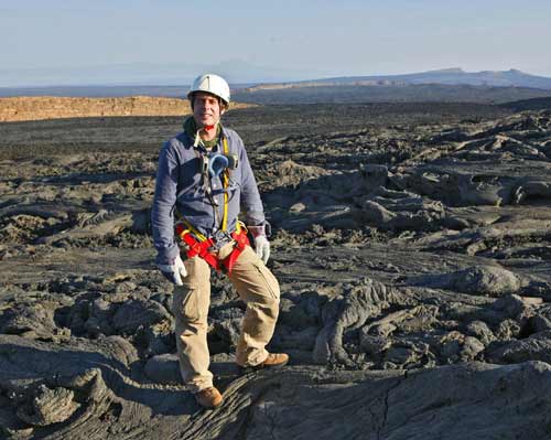 Iain Stewart abseiling into the mouth of the volcano Erta Ale, Ethiopia