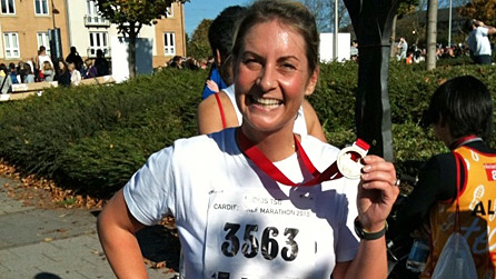 Louise with her medal after running... Louise with her medal after running...