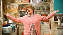 Agnes (Brendan O'Carroll) interferes with Dermot's wedding plans