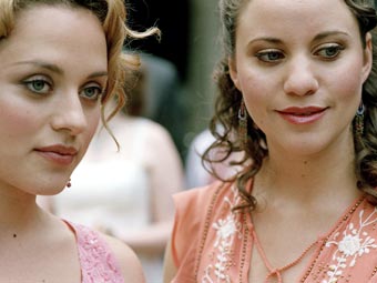 Hermia (Zoe Tapper) and Helena (Michelle Bonnard)