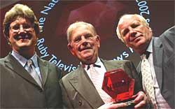 Bruce Parker collects the Director's Special Award from Greg Dyke and Mark Byford