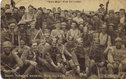 Happy "Tommies" wearing Hun helmets Happy "Tommies" wearing Hun helmets