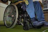 Image of a man in a wheelchair