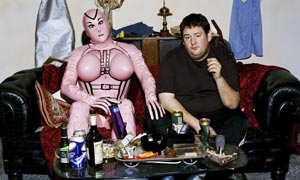 Blow-up doll and Johnny Vegas as Moz