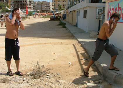 JK & Joel take up the challenges set by Vernon's listeners - JK had to get a rub down from a man on the beach whilst Joe had to twang as many bikinis as possible in 60 seconds

