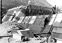 Centre section of dam wall is built onto side section