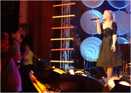 Natasha Bedingfield on stage at the R1 / TOTP Christmas Party