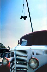 A Ferguson Tractor hangs high above the show field