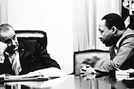 President Lyndon Johnson discussing the Voting Rights Act with Martin Luther King