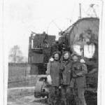 Three of the girls in front of one of the searchlights at Luton Three of the girls in front of one of the searchlights at Luton