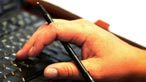 A laptop and pen