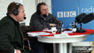 Day 1 - Alan Thompson and Jamie Owen talk to a guest at the show.