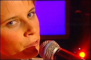 Alex sings for survival.