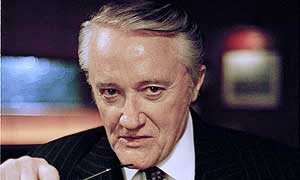 Robert Vaughn plays Albert Stroller
