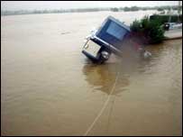 Boat sinking in the floods