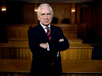 Paul Freeman as Laurence Scammel QC