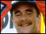 Nigel Mansell celebrates winning the GP in 1987