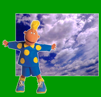 Jake stands before cloudy sky