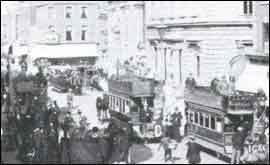 Two horse-drawn double deck cars at The Cross, Worcester
