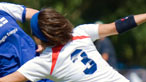 Sue Pioli (in white) forcing a Finnish player at the European Championships 2007. Copyright: Graham Bailey.