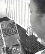 Angela with a black history book