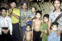 Image: Chong-Cha Lee a Hmong CIA secret veteran rebel soldier with his family in the jungle of Laos