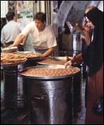 Preparing food for a muslim feast
