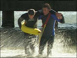 Trainee lifeguard performing a rescue