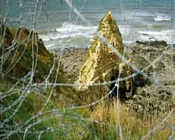 At Pointe du Hoc a party of Rangers scaled these cliffs in the teeth of gunfire, mortars and grenades