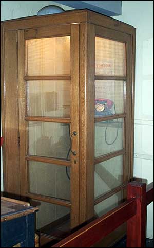 The telephone in its secure booth