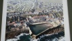 Ariel view of the harbourside and houses.