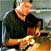 Douglas plays Guitar.