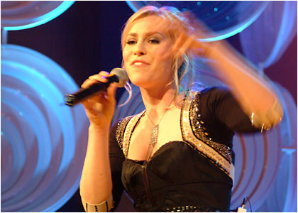 Natasha Bedingfield on stage at the R1 / TOTP Christmas Party