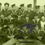The Crew of HMSS Wyoming including the Officers -  Frederick Oliver is second from the right on the back row. This card was sent to his Grandma who was in Blackpool in 1944
