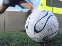 Kicking a football