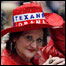 Eleitora de Barack Obama em comício em Austin, no Texas