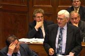 Image of Seamus Mallon addressing the assembly on the day of his resignation