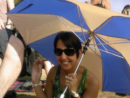 Makes a change for a brolly to shade you from the sun ...