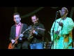 Justin Adams with Juldeh Camara live at the Old Fruitmarket. Photo by Louis Decarlo