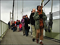 Marchers walking across the Humber Bridge