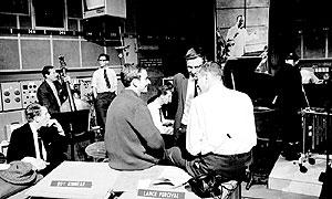 That Was The Week That Was: (foreground l-r) Lance Percival, David Kernan and compere David Frost talking to producer Ned Sherrin