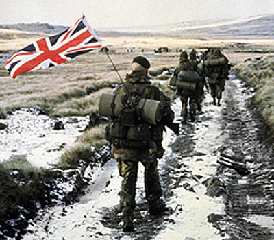 A column of 45 Royal Marine Commandoes march towards Port Stanley.
