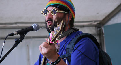 Adam Buxton slams it to the Hub tent crowds...