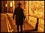 The Ghost Detective walking up street